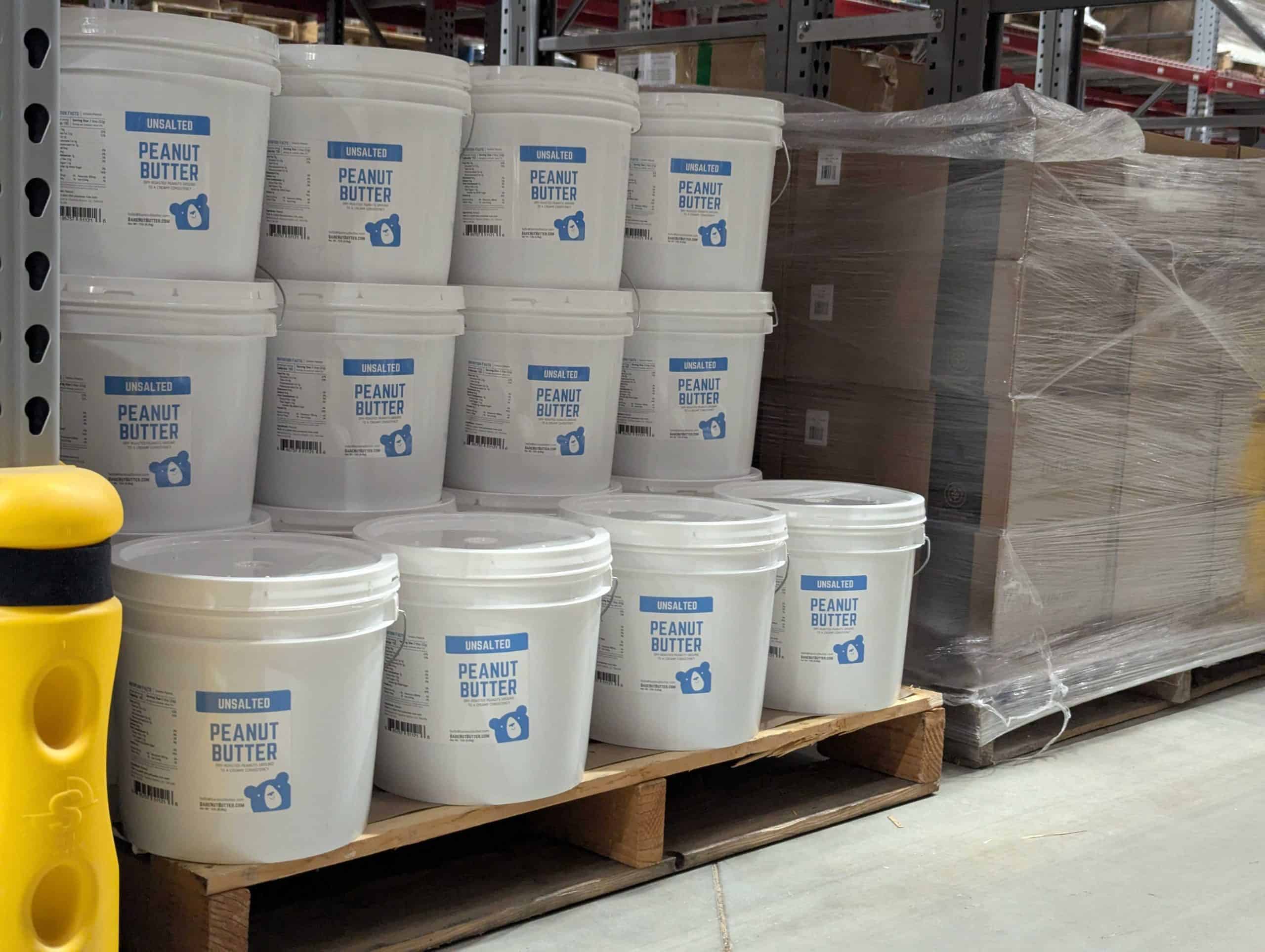 buckets of client product securely and safely stored in a warehouse.