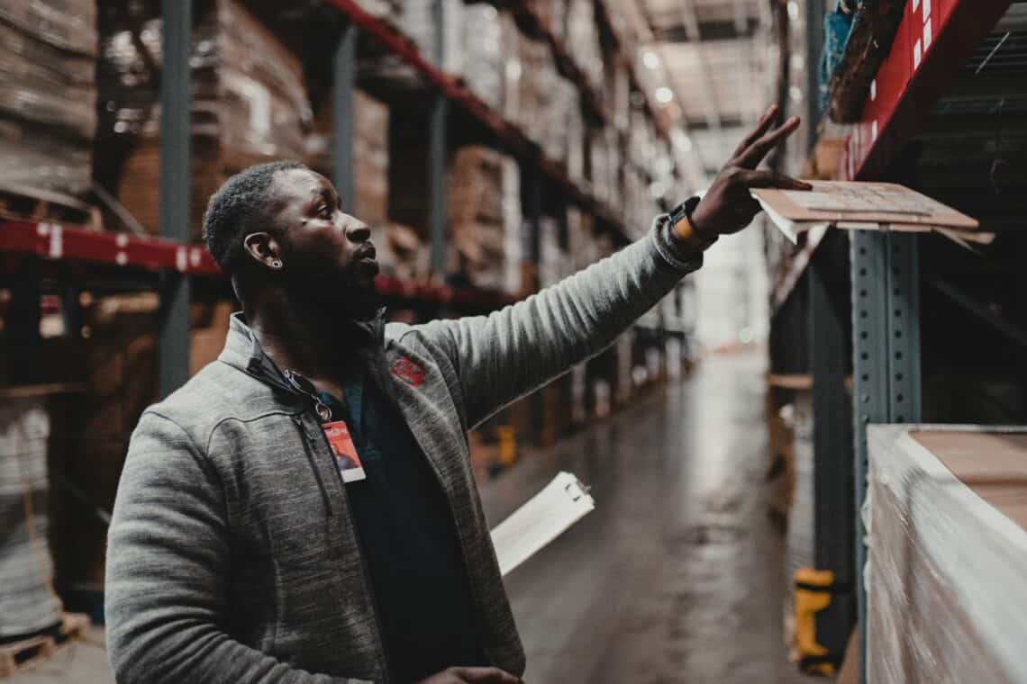 Red Stag team member checks warehouse inventory and location information to keep business moving