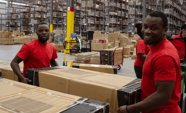 Red Stag Employees Handling Large Item