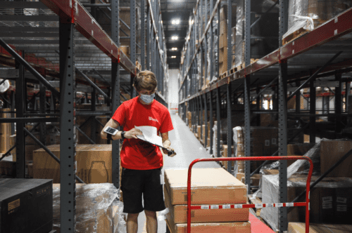 warehouse picker fulfilling oversized product order