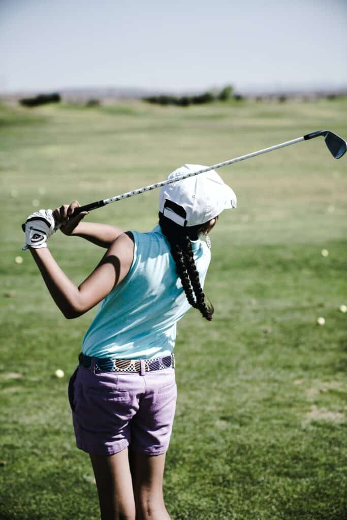 woman playing golf